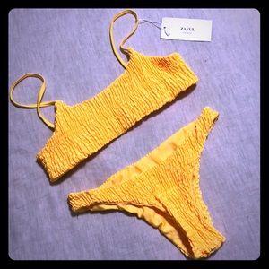 Smocked Bikini in yellow. NWT